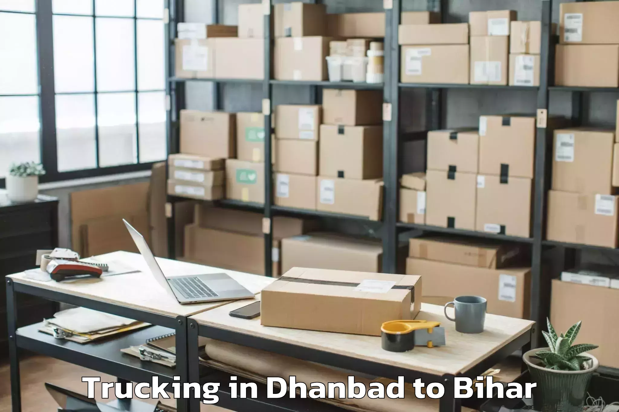 Book Dhanbad to Marouna Trucking Online